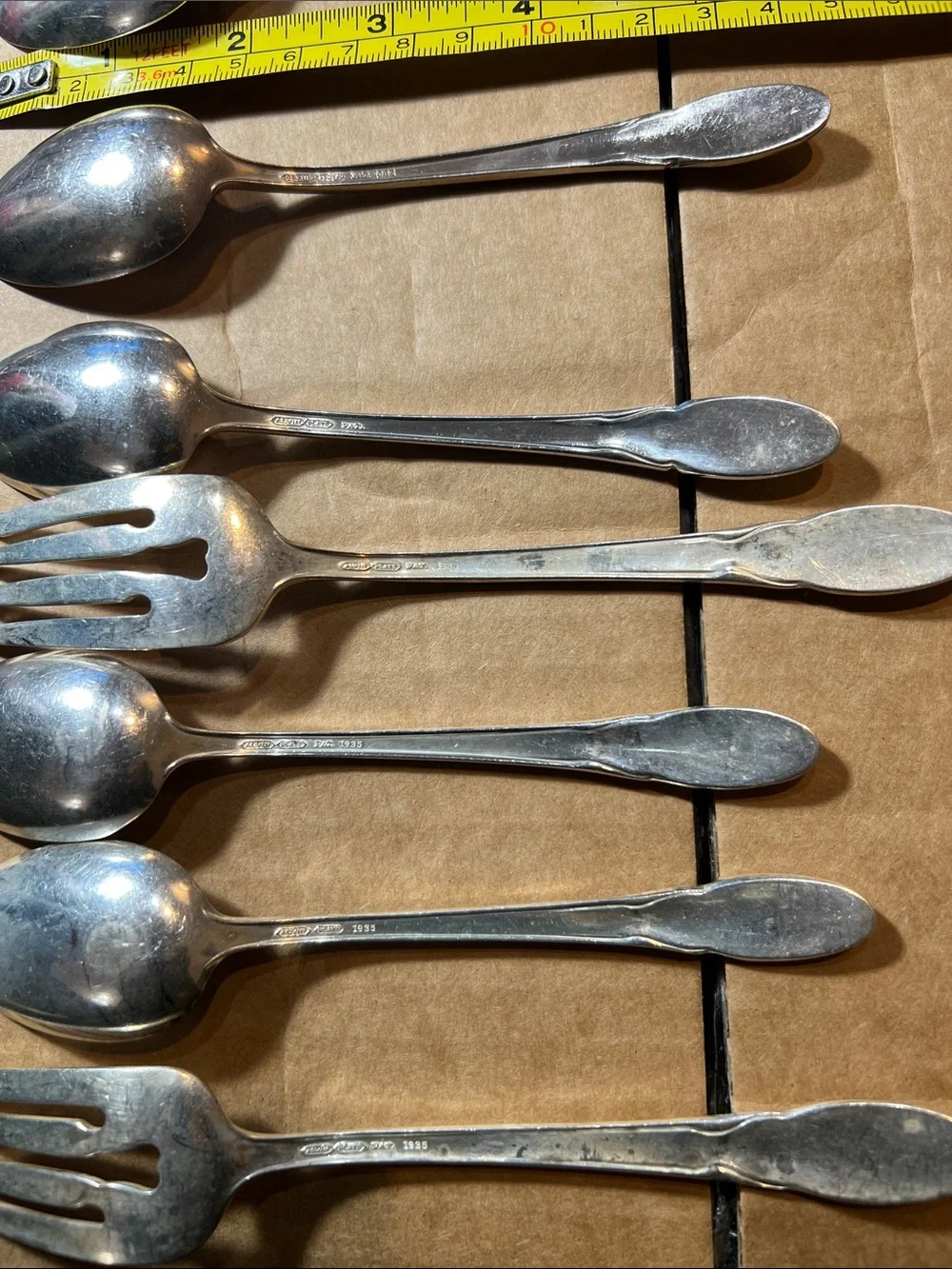Silver plated spoons and forks  Alvin plate 1935  Great addition  Total of 9
